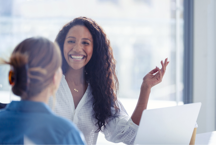 Two business women talking